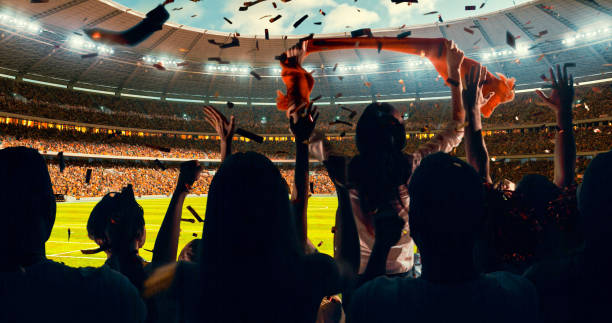 istock Fans cheering for sports team 1128858910