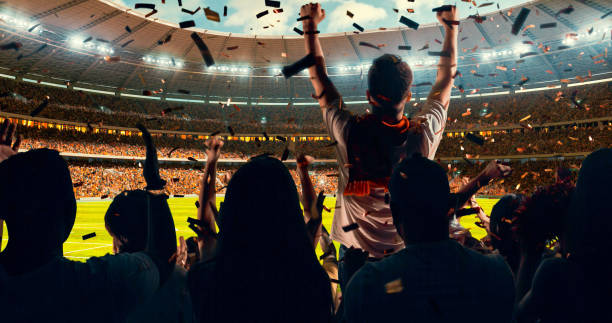 istock Fans cheering for sports team 1128858942