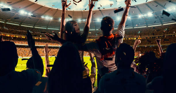 istock Fans cheering for sports team 1128858954