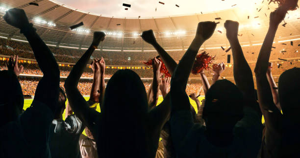 istock Fans cheering for sports team 1128858955