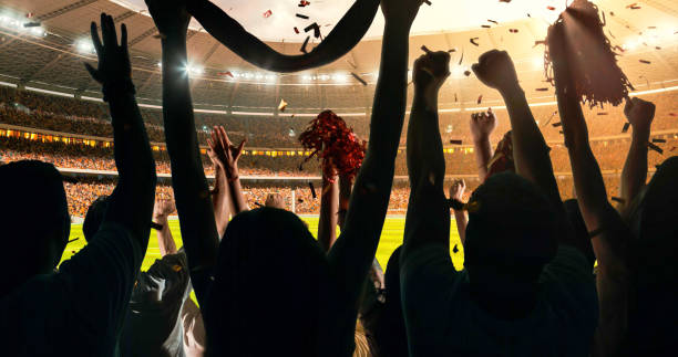 istock Fans cheering for sports team 1128858962