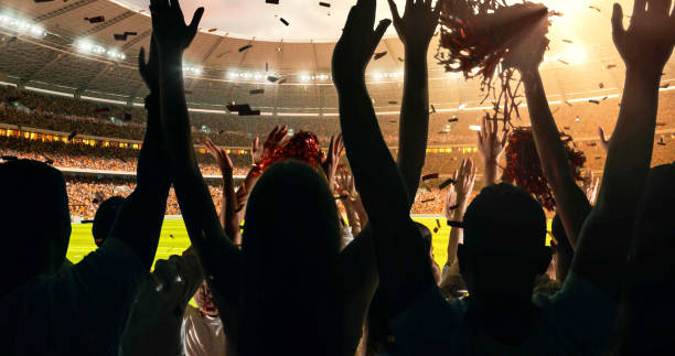 istock Fans cheering for sports team 1128858966