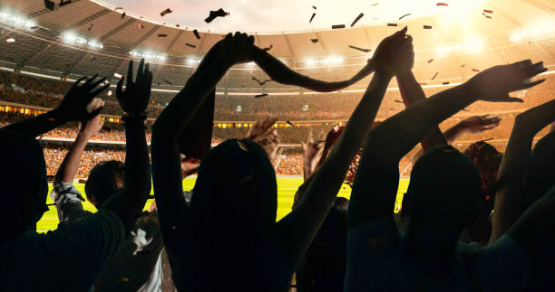istock Fans cheering for sports team 1128858968