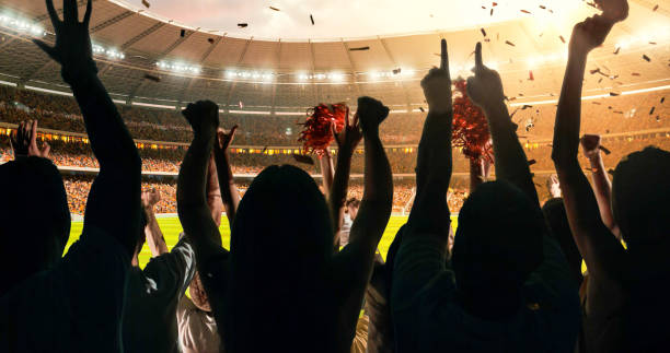 istock Fans cheering for sports team 1128858974