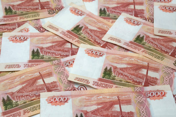 istock Horizontal background of bundle of five thousand Russian ruble banknotes 1128859273