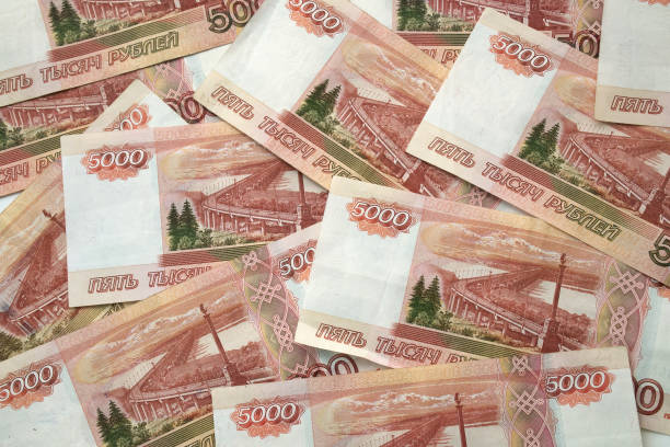 istock Horizontal background of bundle of five thousand Russian ruble banknotes 1128859279