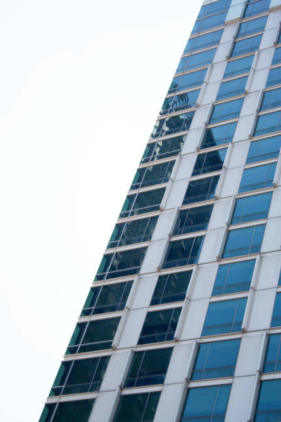 istock Blue glass building facade detail 1128860297