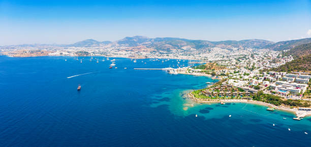 istock Panoramic aerial view of sunny Bodrum with resorts and beachfront villas 1128862275