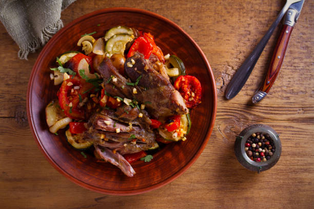 istock Slow cooker lamb with tomatoes, zucchini, eggplant, onion and garlic 1128862332