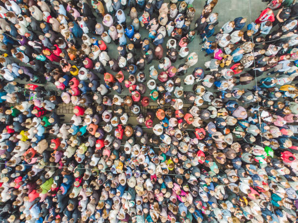 istock LVIV, UKRAINE - October 7, 2018: aerial view religious procession at city streets 1128862507