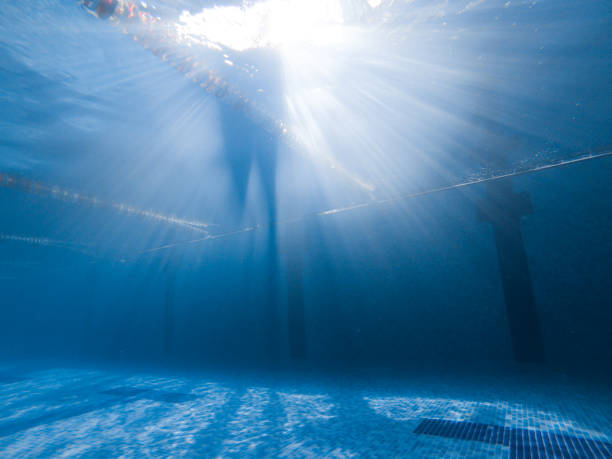 istock view of the poll underwater. blue. sport. 1128863123