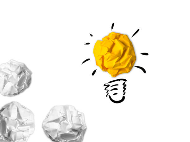 istock Idea light bulb success inspiration crumpled paper isolated background 1128863274