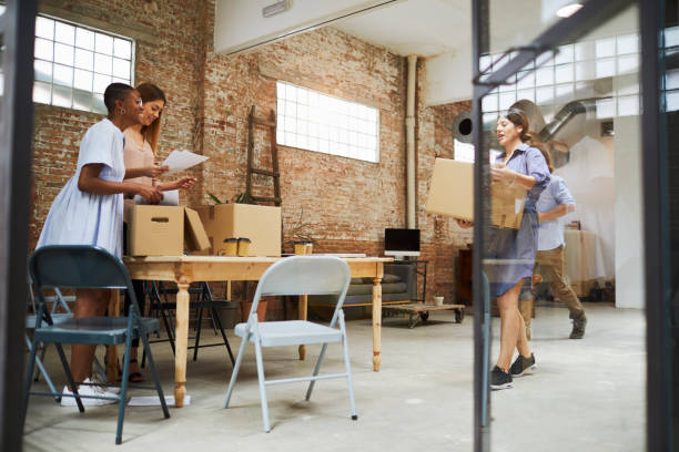 istock Business relocation, moving into new office space. 1128864189