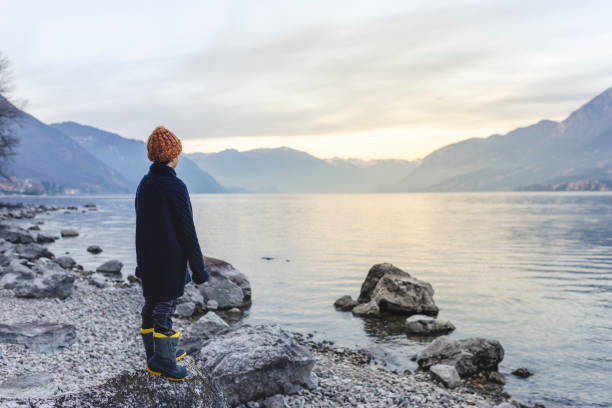 Camping adventure on the shore of the lake with a tent