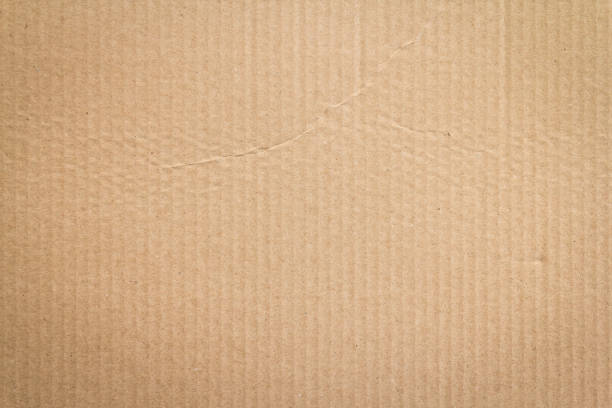 boîte de papier brun ou texture feuille en carton ondulée - brown paper paper striped corrugated cardboard photos et images de collection