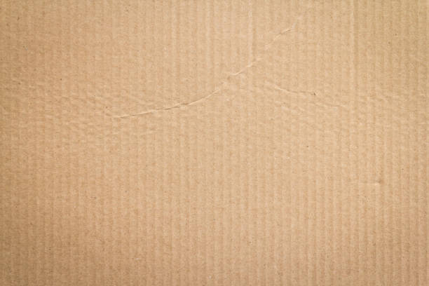istock Brown paper box or Corrugated cardboard sheet texture 1128865536