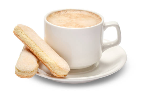 White ceramic cup of coffee with a savoiardi ladyfinger cookie on a platecisolated on white background