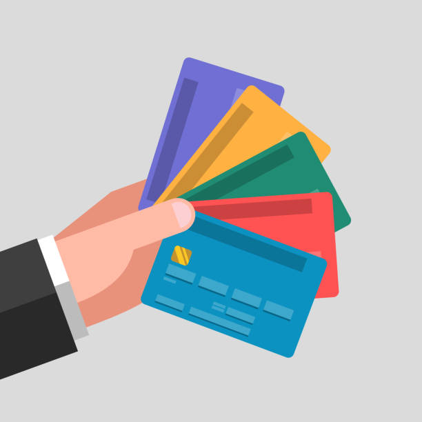 Many bank cards in one hand vector art illustration