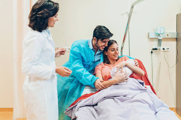 istock Young parents welcoming their baby 1128870495