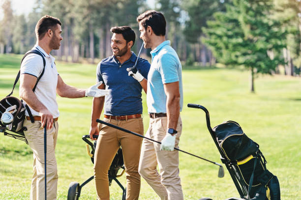 istock Group of golfers discussing the game 1128870499