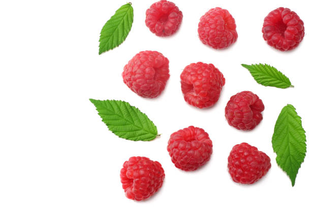 istock ripe raspberries with green leaf isolated on white background. top view 1128871319