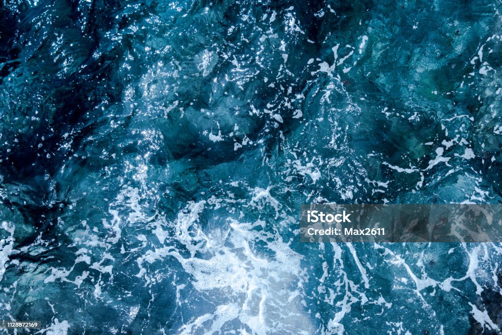 Blue deep sea foaming water background Sea Stock Photo