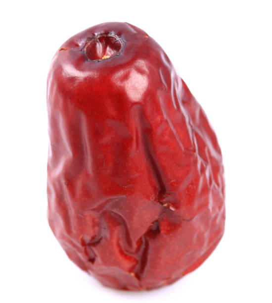 istock Dry red jujubes isolated on white background 1128875469