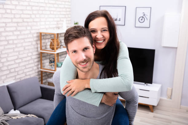 istock Happy Couple Having Fun At Home 1128875507
