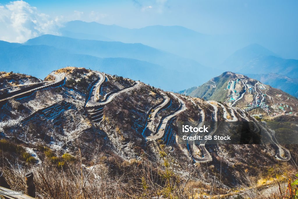 Zuluk hilltop the transit point of Silk Route From Thambi View Point. The road makes 32 hairpin turns. Located on rugged terrain of lower Himalaya in Sikkim. Historic Silk Route from Tibet to India. Silk Road Stock Photo