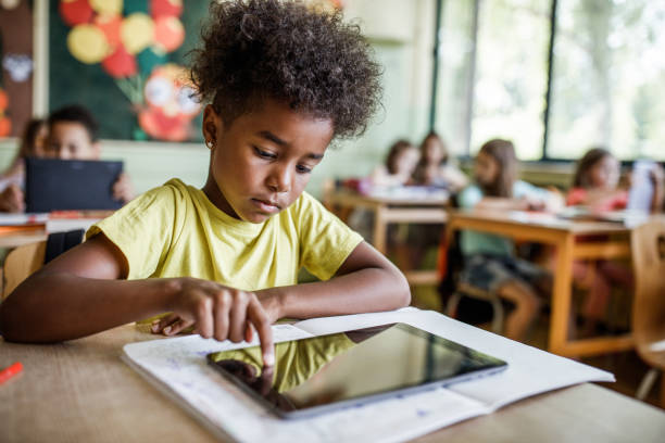 Student Using Touch Screen 75,600+ Students Using Tablets Stock Photos, Pictures & Royalty-Free ...