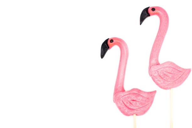 istock Lollipops in the form beautiful flamingo 1128878312