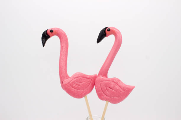 istock Lollipops in the form beautiful flamingo 1128878323