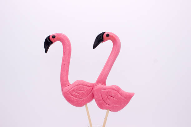istock Lollipops in the form beautiful flamingo 1128878358