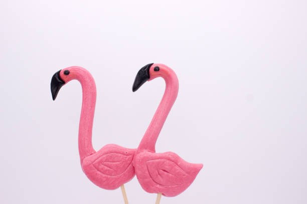 istock Lollipops in the form beautiful flamingo 1128878385