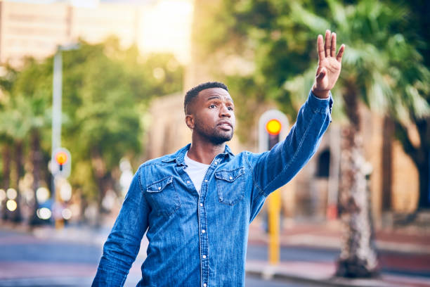 istock Trying to catch a cab in the city 1128880076