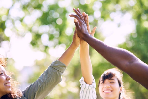 istock High five for a joyous day in the park 1128880127