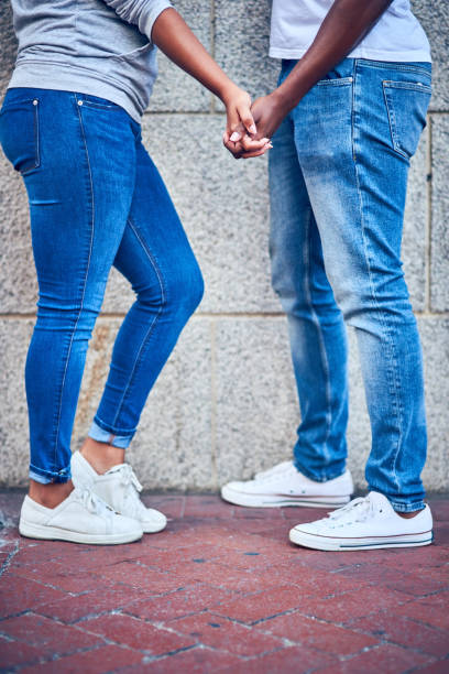 istock Hold my hand, let's take a walk in the city 1128880177