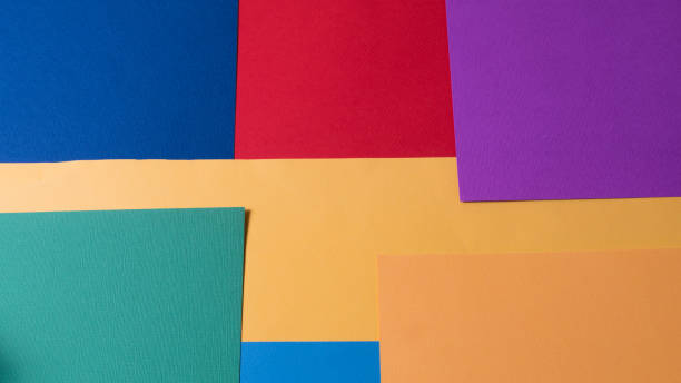 istock Pastel creative colors paper background, view from above, banner. 1128880367