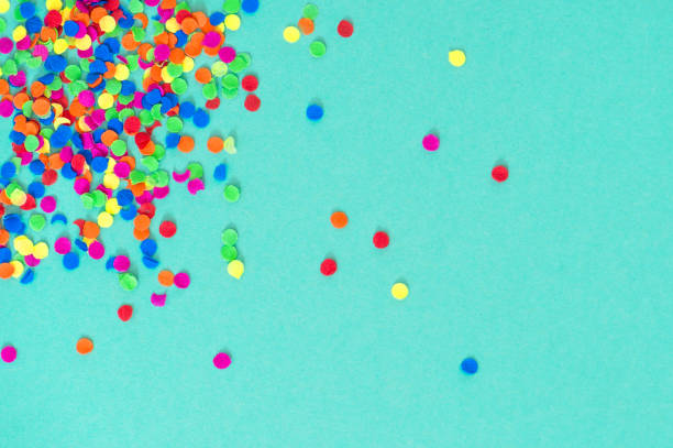 istock Confetti carnival decoration blue paper background 1128882359