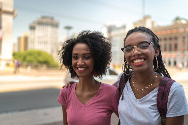 Afro latinx young women in the city portrait Best friends forever afro latinx ethnicity stock pictures, royalty-free photos & images