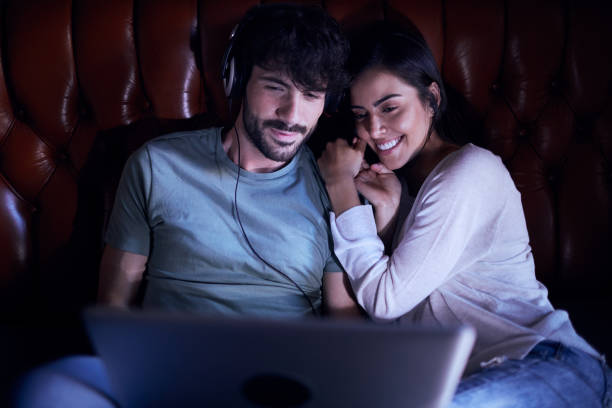 istock Watching a movie online. 1128885083