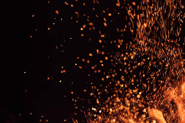 istock Burning sparks flying. Beautiful flames background. 1128885776