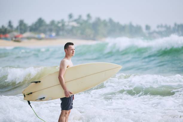 istock Portrait of surfer 1128886156