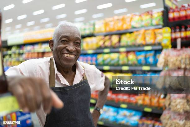 Afro Senior Man Business Owner Employee At Supermarket Stock Photo - Download Image Now