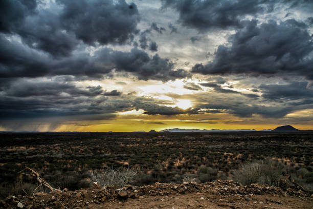 istock Sundowner when a big thunderstorm is coming up in Namibia 1128888803
