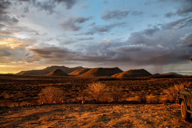 istock Sundowner when a big thunderstorm is coming up in Namibia 1128888816