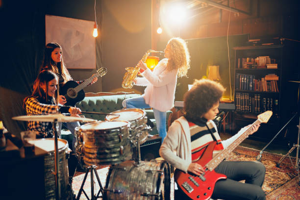 istock Girls playing jazz music. 1128888930