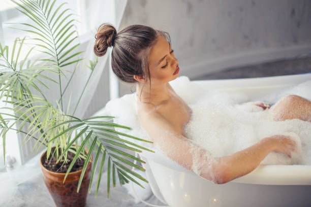 istock glamorous girl resting in the spa center 1128890247