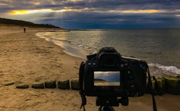 Photographing by the Sea Long Exposure at the Baltic Sea Camera Photography by the sea Long exposure at the Baltic Sea Camera rostock photos stock pictures, royalty-free photos & images