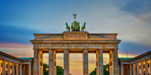 istock Brandenburg gate illuminated at sunset , Berlin, Germany 1128891784